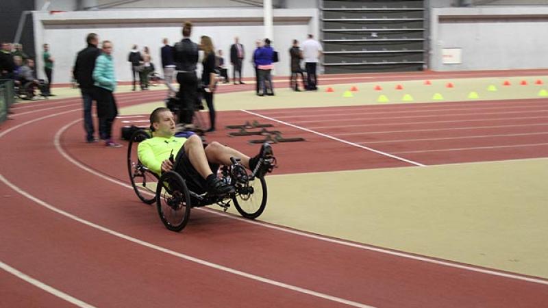 Handcyclist cycling on a track